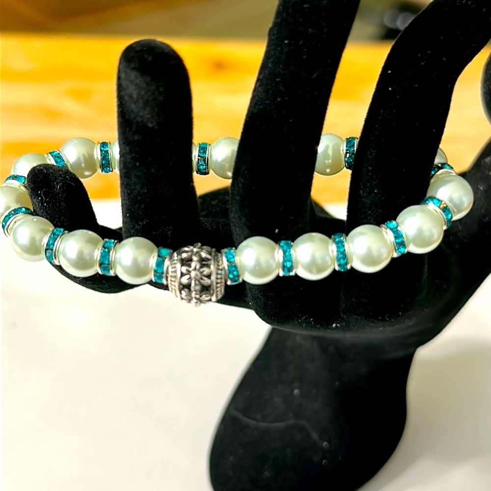NWOT Handmade White and Aqua Bracelet with Beautiful Silver piece in front.